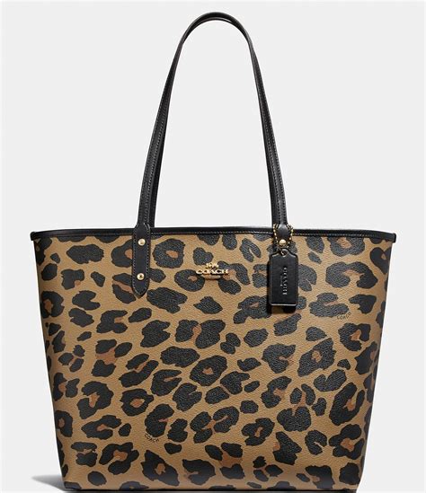 Dooney & Bourke Double Zip Leopard Animal Print Patent Leather Tote Bag. . Leopard coach purse